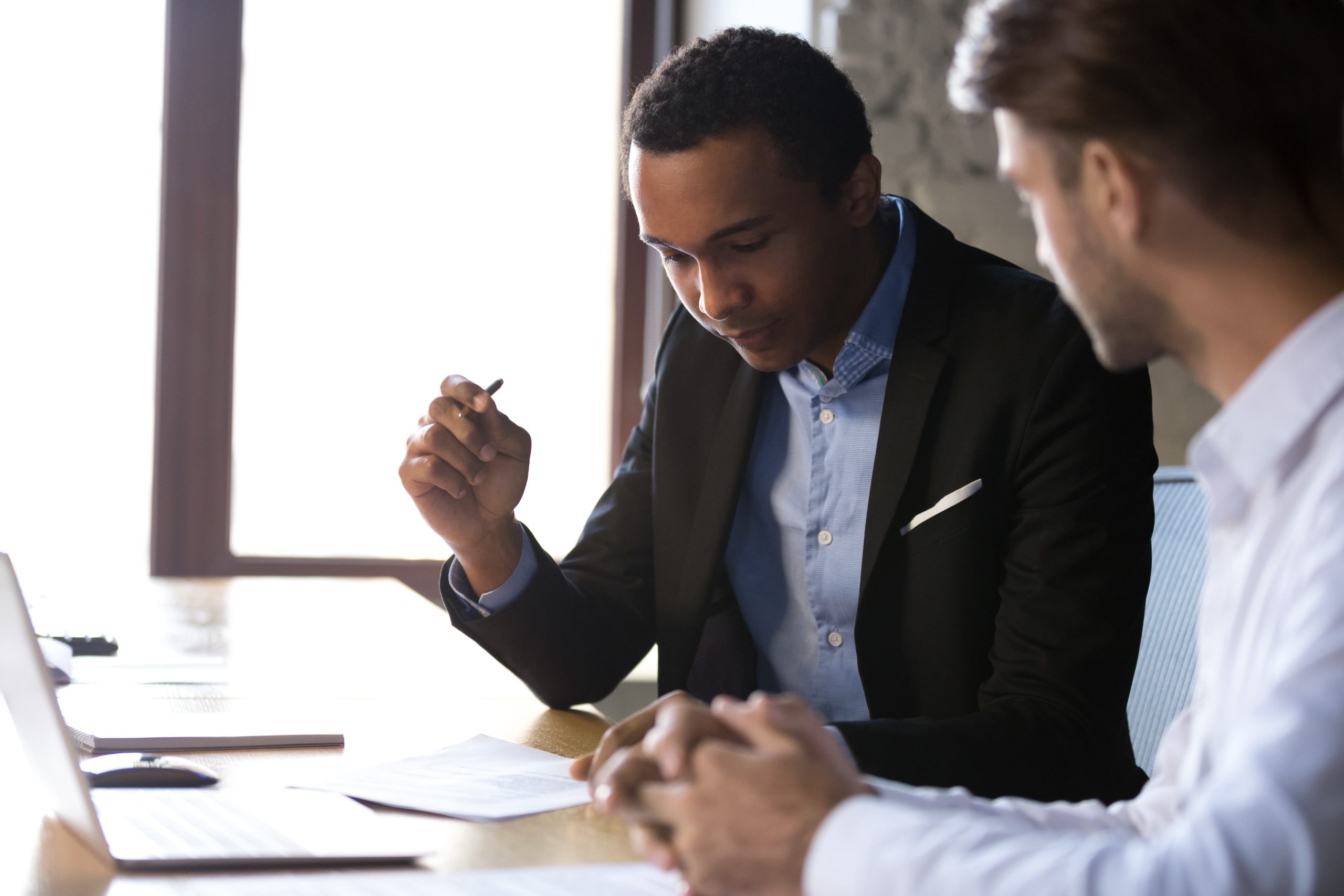 two men working at a desk