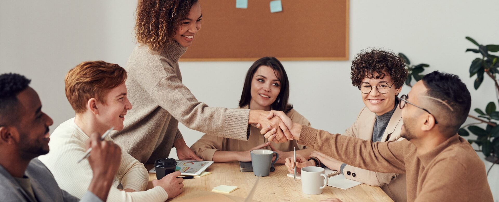 HR Consultants Meeting Around Boardroom Table